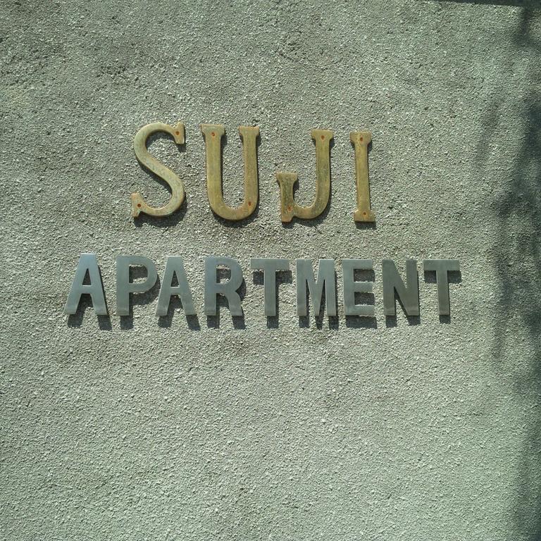 Suji Apartment Бали Стая снимка