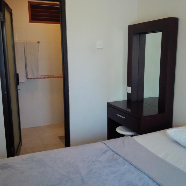 Suji Apartment Бали Стая снимка