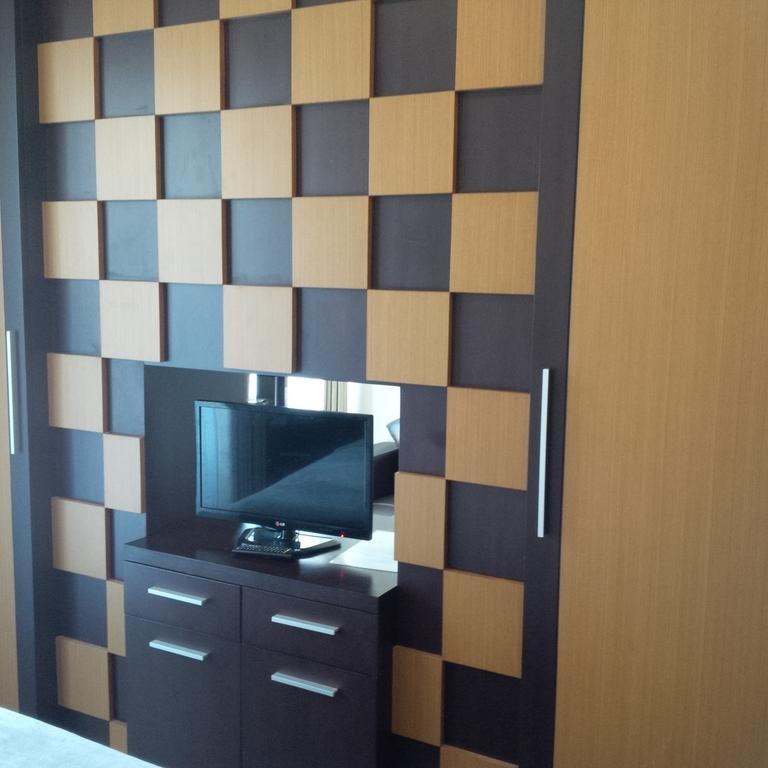 Suji Apartment Бали Стая снимка